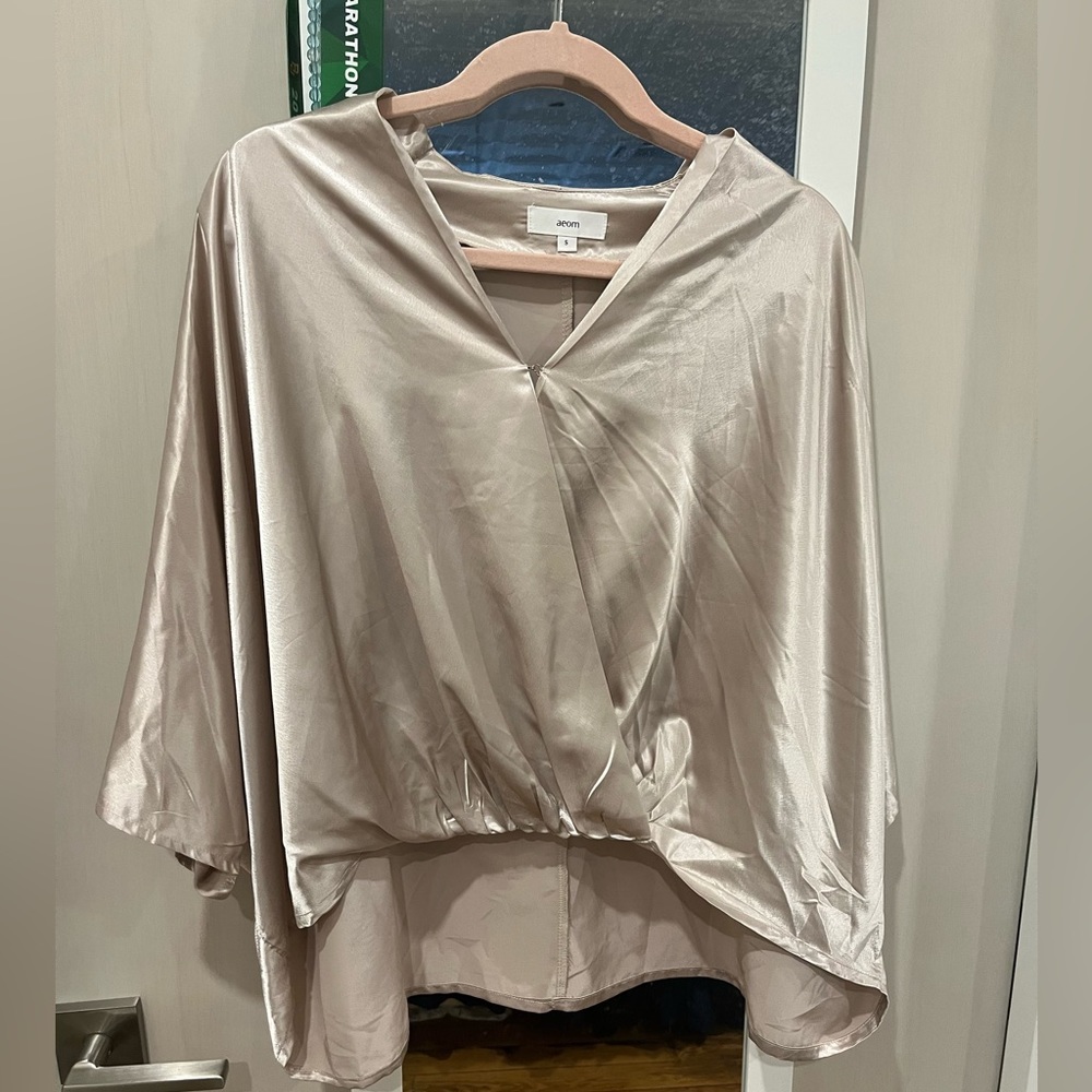 shiny, soft pink shirt